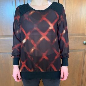 Sheer black and red top.